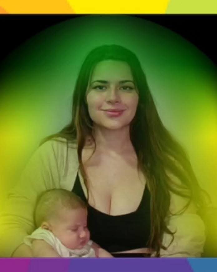Mother and baby surrounded by a green aura portrait