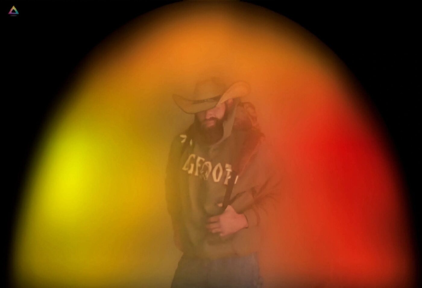 Client surrounded by a warm orange and yellow aura portrait