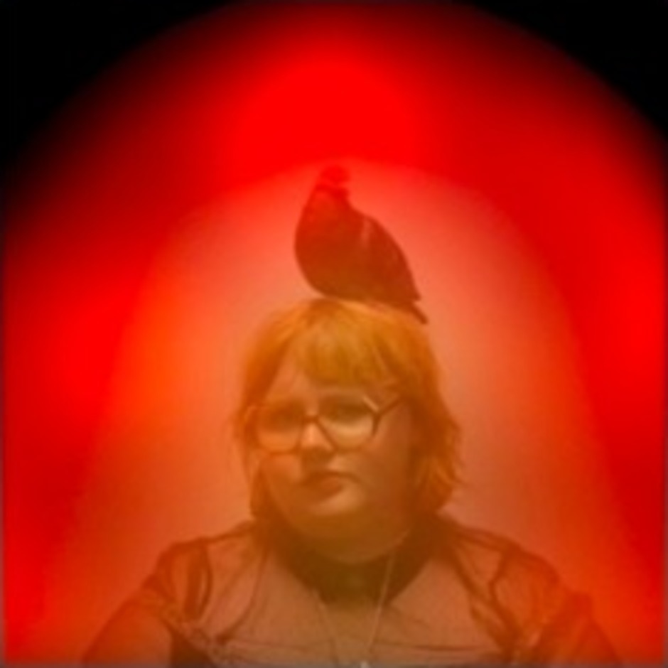 Client surrounded by a vivid red aura portrait