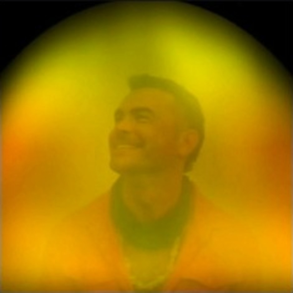 Client surrounded by a bright yellow and green aura portrait